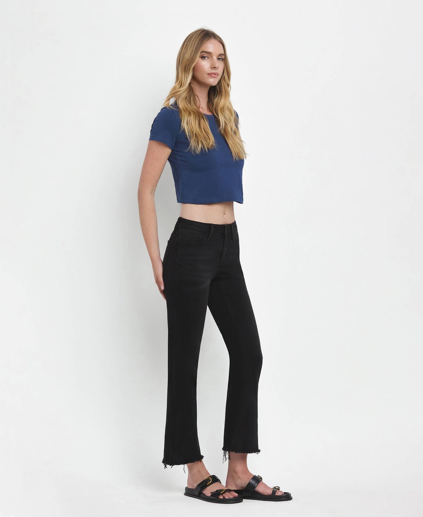 Mid Rise Raw Distressed Hem Crop Flare Jeans